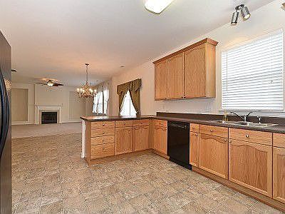 Spacious kitchen with walk-in pantry and plenty of cabinets and counterspace