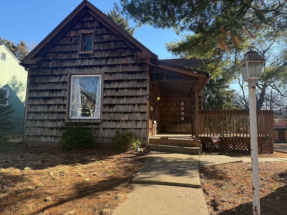 wood-shingled cottage with large flat back yard. Fully fenced.