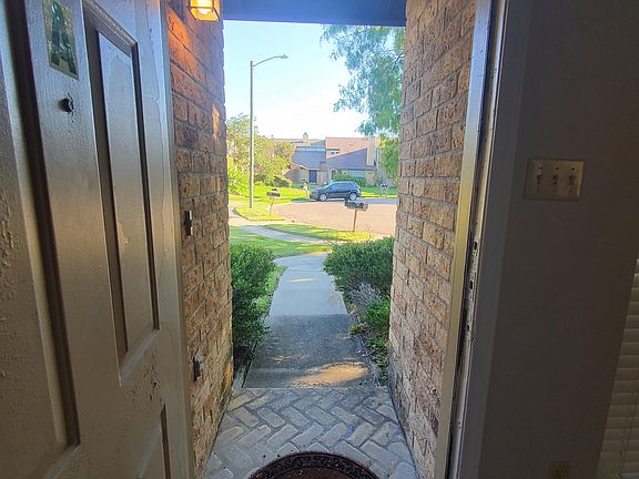 Looking out front door to cul-de-sac .