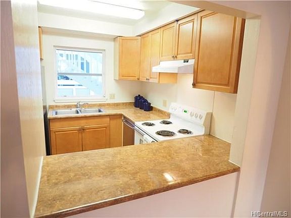 Updated kitchen cabinets and counter tops.