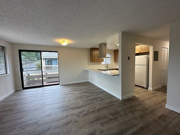View from entrance. Kitchen and deck.