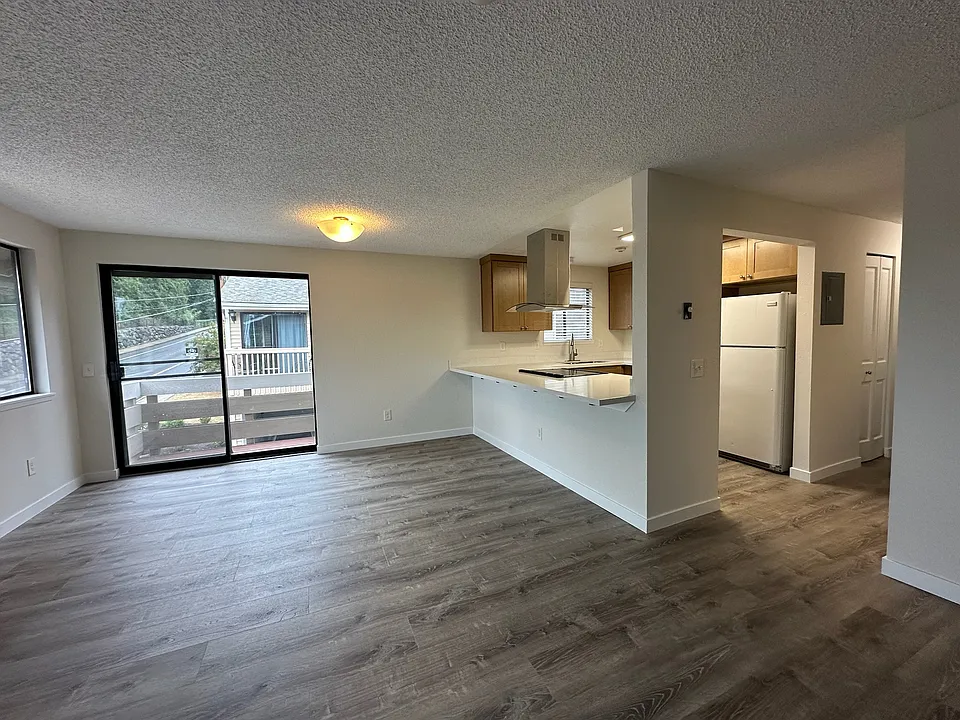 View from entrance. Kitchen and deck.