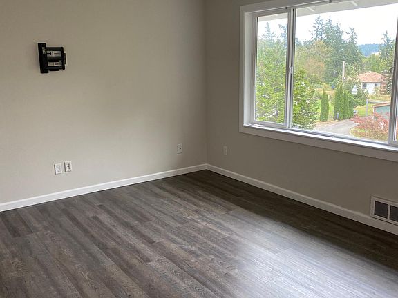 Living Room with wall mount for flat screen Television