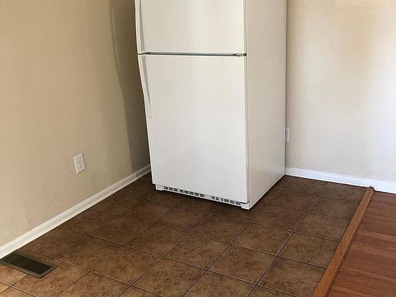 New Refrigerator & Tiled Dining area