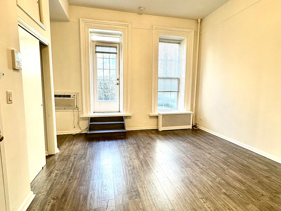1st image of 230 E 58th St APT 1A