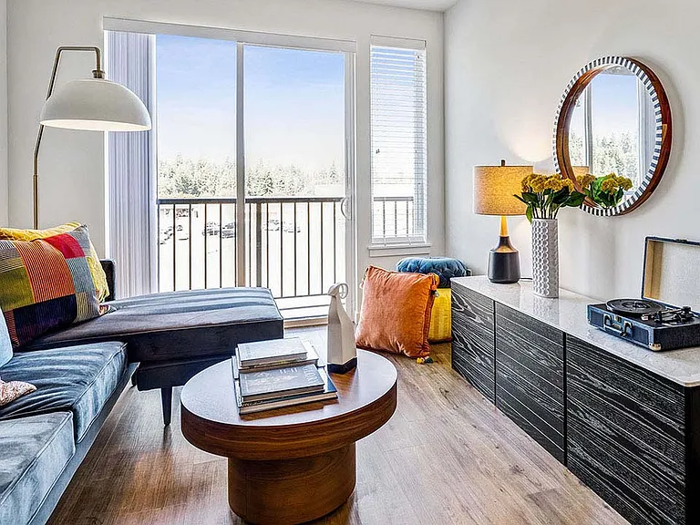 Griffis Shoreline apartment living room with wood style floor.
