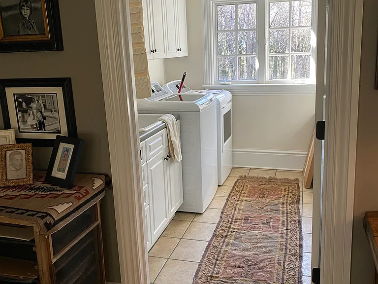 Upstairs laundry room off the family room