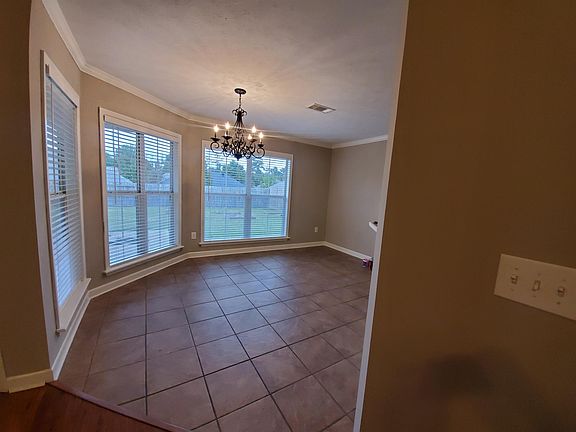 Large eat-in area. Lots of windows with view of back yard.