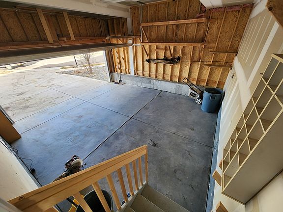 2 CAR GARAGE WITH BUILT IN SHELVES