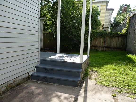 Small private porch. Has swing. Not pictured