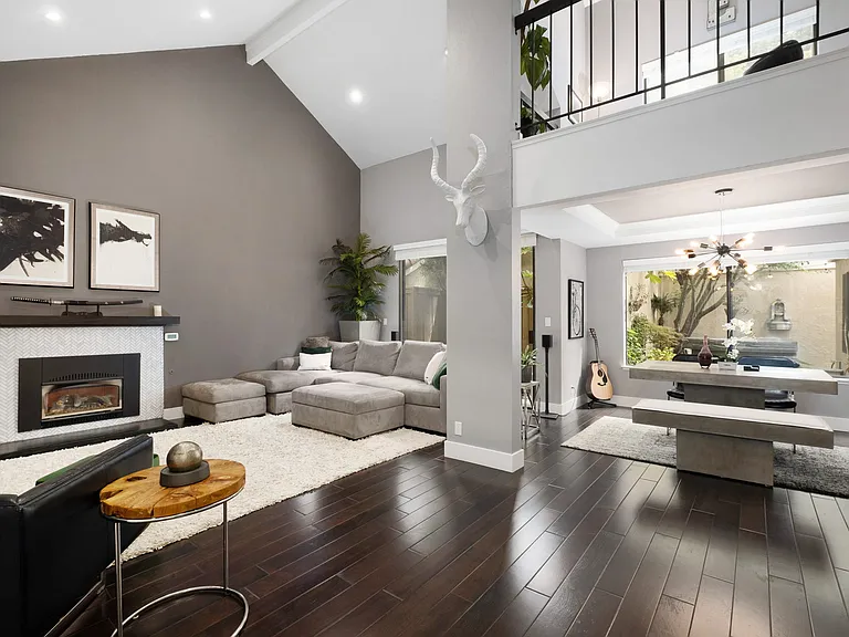 Living & Dining room view with your home office loft right above on the 2nd floor w/beautiful window views.