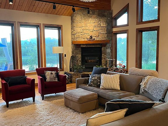 Living room with Heatalator fireplace.