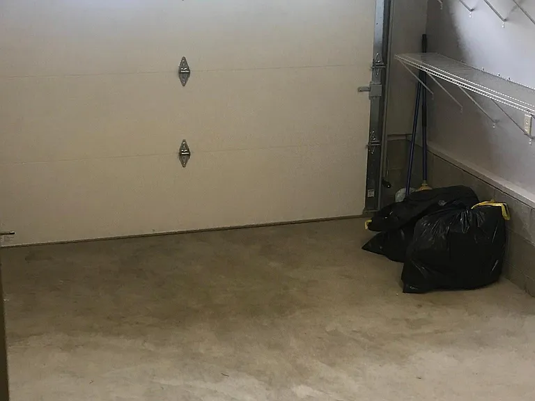 Looking into garage from inside townhouse.