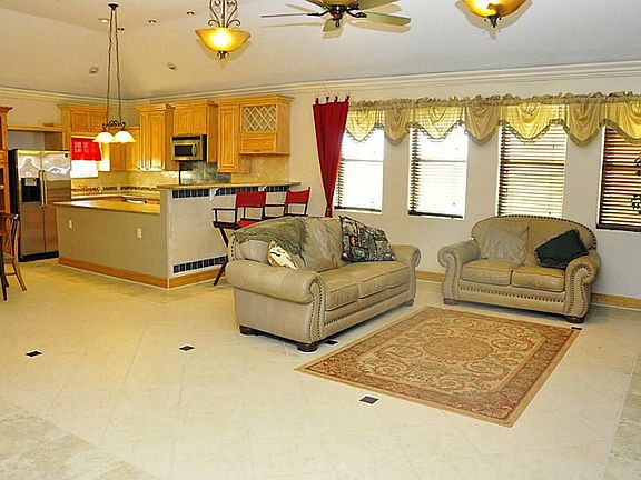 Huge den 17x18 opens to the kitchen