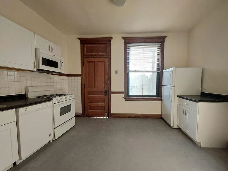 Kitchen with D/W and hood microwave