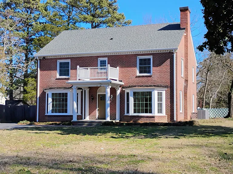 Five bedrooms, three full bathrooms.