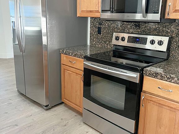 Kitchen with stainless steel appliances