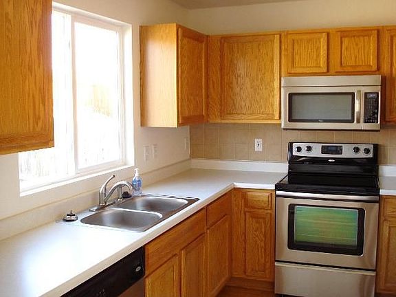 Kitchen with new stainless steel appliances