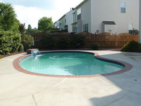 in ground pool back yard