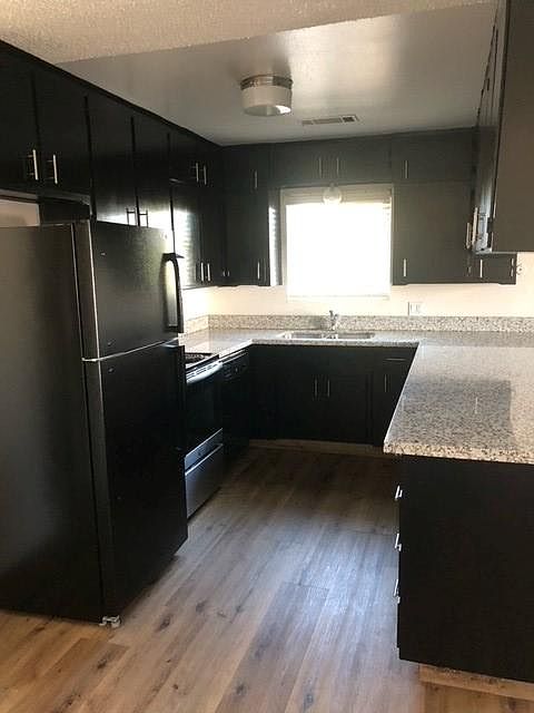 Granite kitchen counters and newer refrigerator