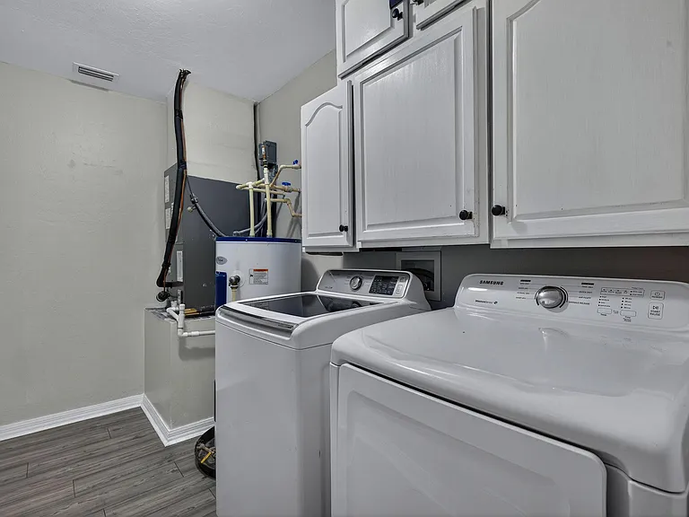 In-Residence Laundry Room with a full-size washer & dryer