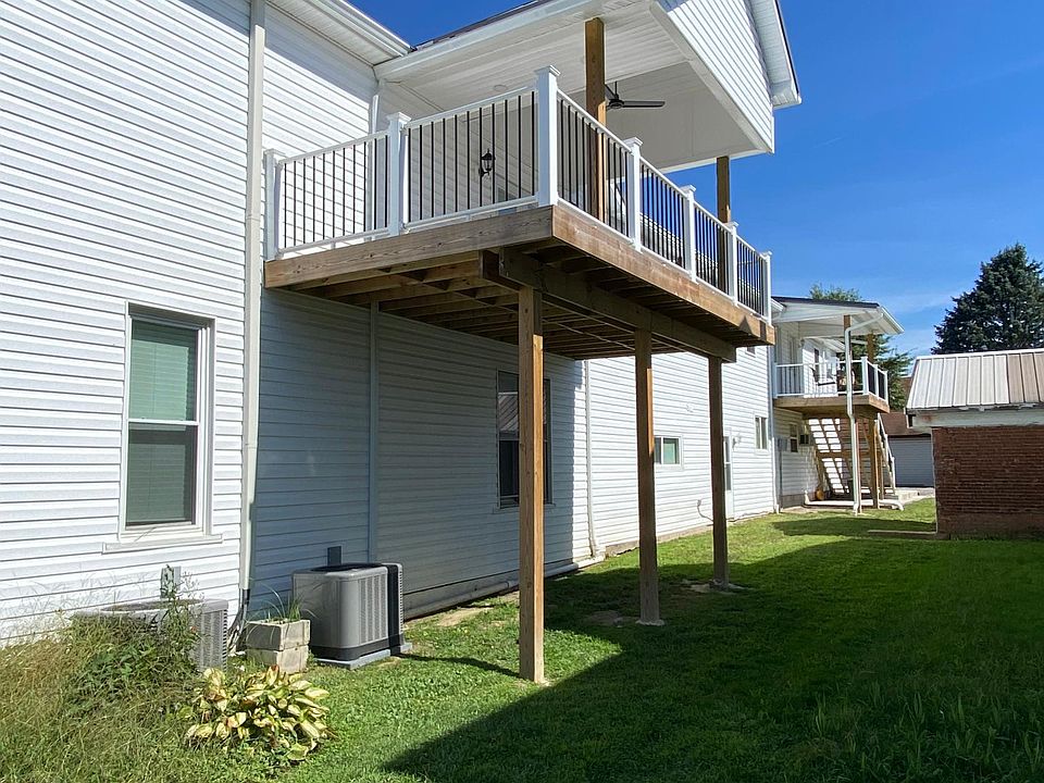covered porch entrance - porch farthest away in picture