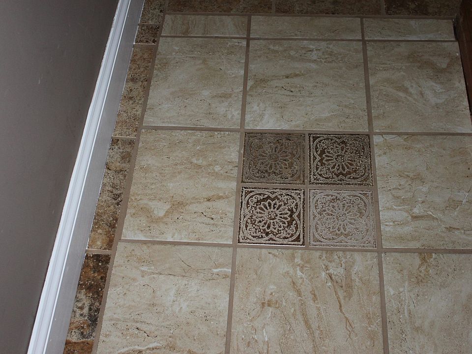 Accent tile bottom of steps