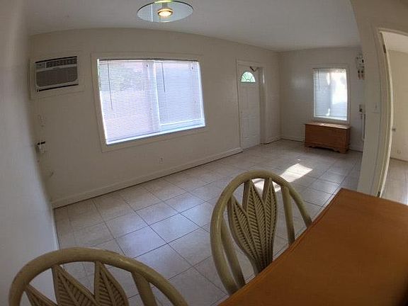 Living room open with dining & kitchen