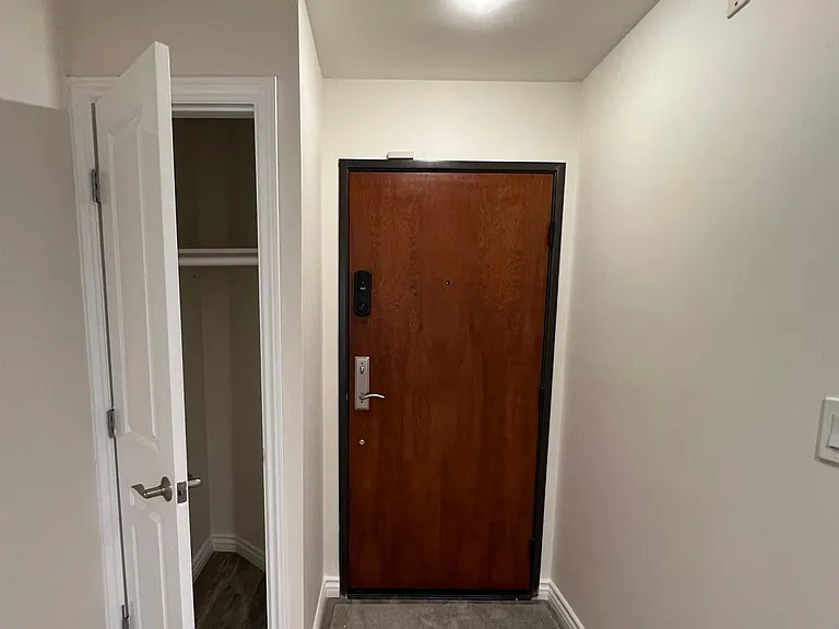 Front door and coat closet.