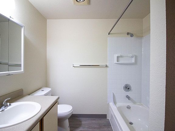 New vinyl floor in select units.