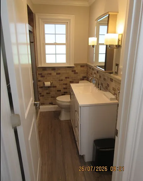 downstairs bedroom with enclosed shower