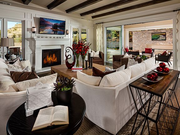 A Cozy Fireplace Grabs Center Attention in the Great Room