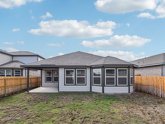 Back exterior of the Callaghan floorplan at a Meritage Homes community.