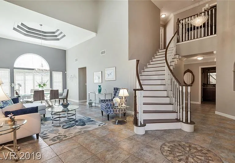 Grand Entrance 
Breathtaking cathedral ceilings, sweeping staircase.