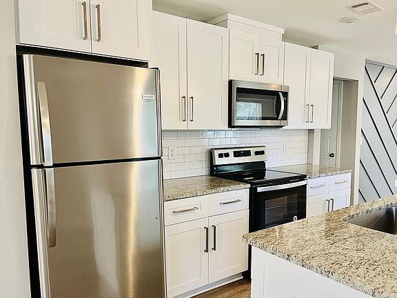 Kitchen with electric appliances