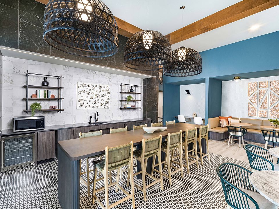 Discover the heart of community living at Modera Georgetown's expansive clubroom, complete with a cozy coffee bar.
