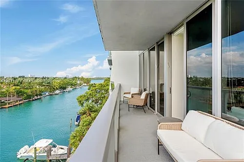 9940 W Bay Harbor Dr Photo 1