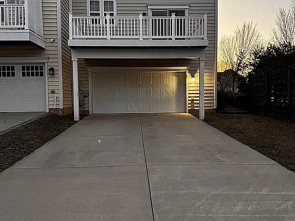 2 car garage with driveway provides ample parking