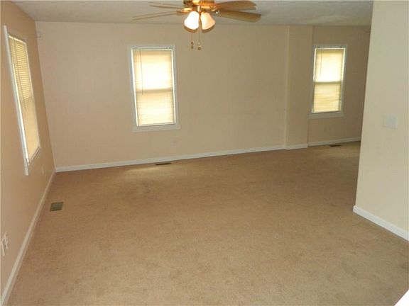 LIVING ROOM, CEILING FAN AND UPDATED VINYL CLAD WINDOWS