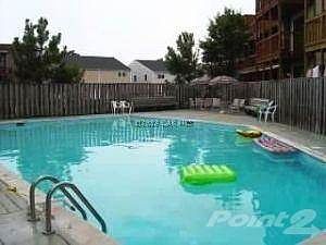 UNIT OVER LOOKS THE POOL