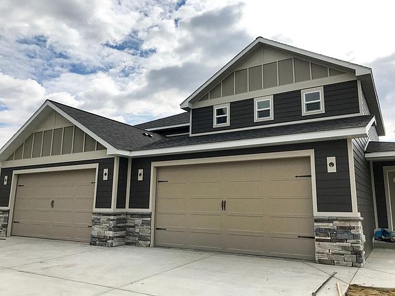 Landscaped yard. 2 car garage