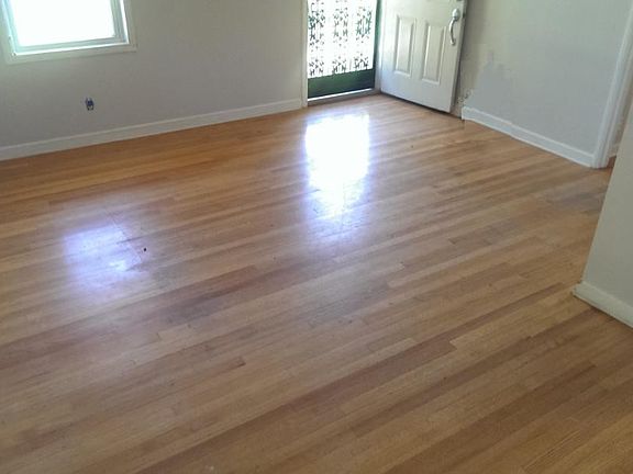 Living Room, Beautiful hardwood floors, Security Door.