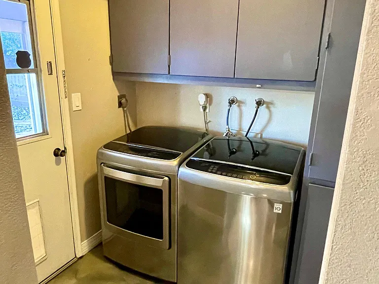 full-size stainless steel washer and dryer included