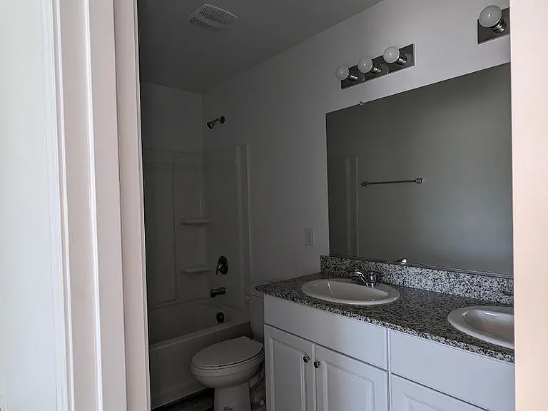 123 E Watson Pl — Photo 16