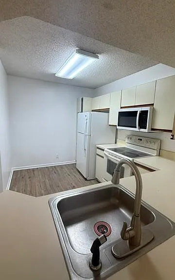8741 Wiles Rd #305 — Photo 12