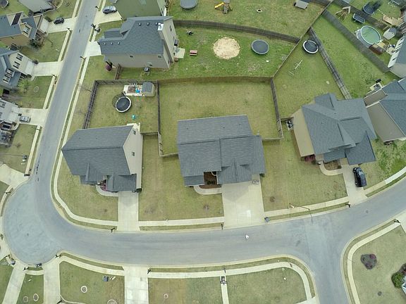 Aerial view of the wide lot.