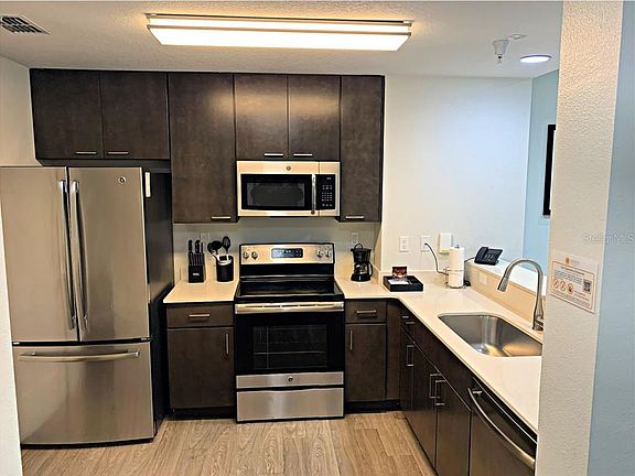 4th image of 14501 GROVE RESORT AVENUE #3231