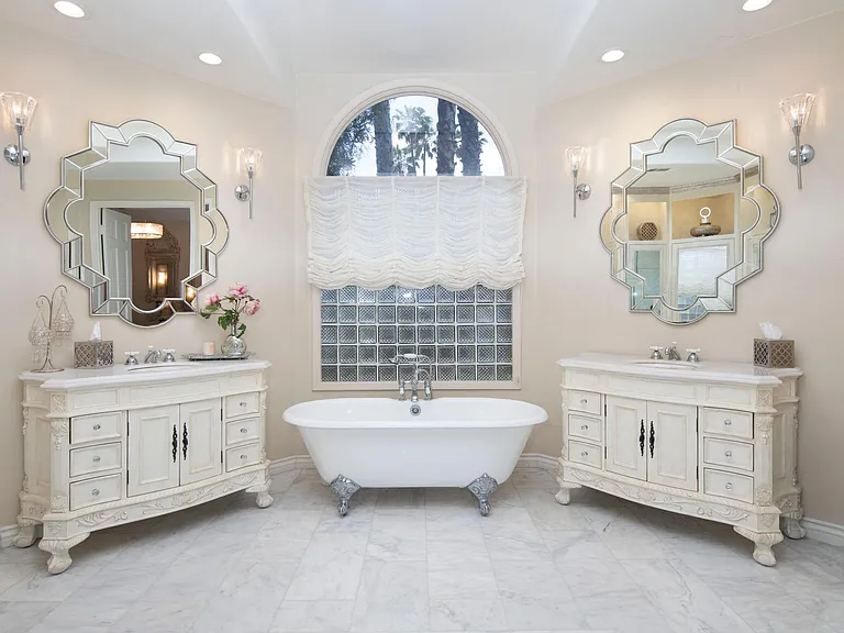 Primary bathroom with duel sinks, walk in shower, gorgeous tub
