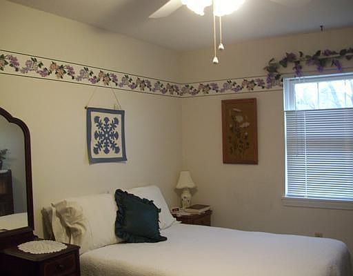 Cheery master bedroom decor.