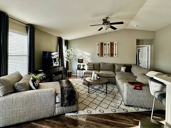Spacious living room with vaulted ceilings